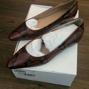Banana Republic leather brown snake skin flats. Never worn
